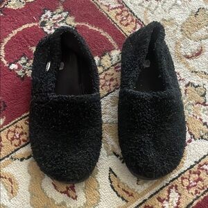 Black fuzzy flats